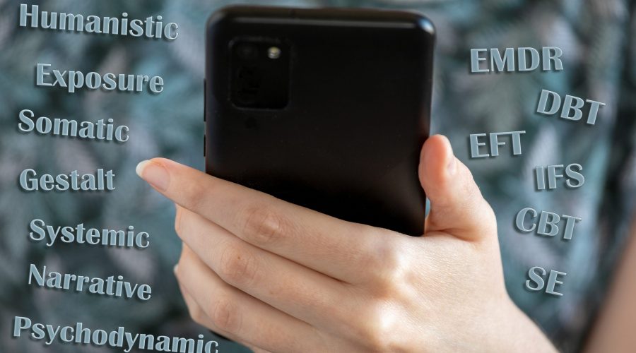 Person,Hand,With,Smartphone,And,Different,Psychotherapy,Kind,Names.,Therapy