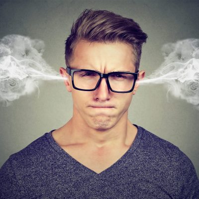 Angry,Young,Man,,Blowing,Steam,Coming,Out,Of,Ears,,About